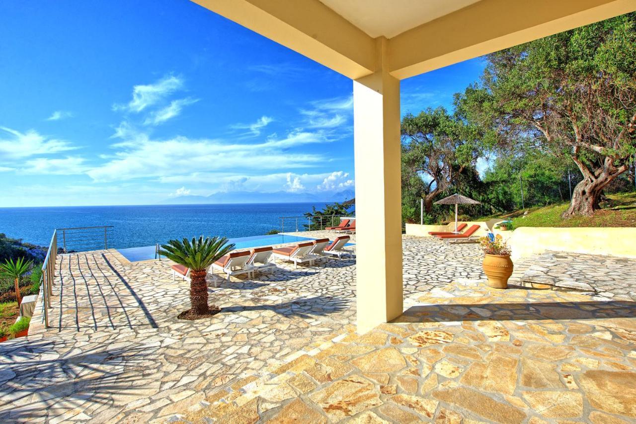 Beachfront Villa Seasun By Posarellivillas Agios Spyridon  Exterior photo